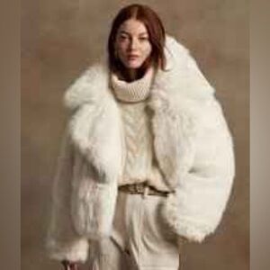 Brand new with tags. Reversible down faux fur coat. Ravishing!